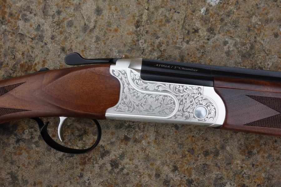 Kofs Sceptre SXE Youth Game, showcasing a close-up of its single trigger ejector, soft rubber butt pad, and flush fitting multi chokes.