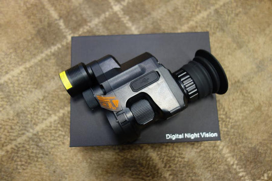 PARD NV007SP Gen 2 Night Vision device, compact design with adjustable LED/IR light, shown on a box, featuring a visible logo.