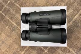 Hawke Nature-Trek 8x42 binoculars displayed on a white surface, ideal for nature observation with a compact design and clear optics.