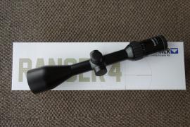 Steiner Ranger 4 3-12 X 56 scope on a white surface, showcasing its sleek design and precision optics for enhanced targeting accuracy.
