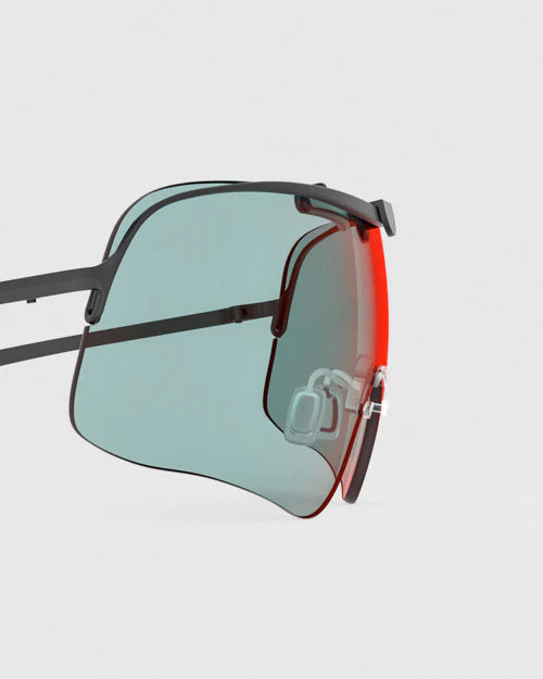 Close-up of Ranger Falcon Lens sunglasses, featuring RIACT A.I and Claysight technology, highlighting their sleek design as a modern accessory.