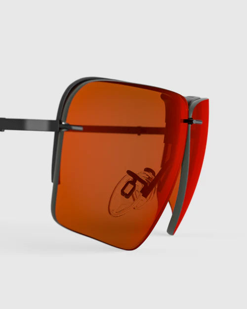 Ranger Edge Lens sunglasses with orange lenses, part of RIACT A.I & Claysight collection, showcasing a sleek, modern eyewear design.