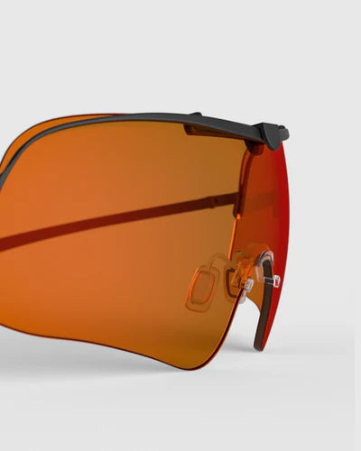 Ranger Falcon Lens sunglasses featuring orange lenses, highlighting RIACT A.I & Claysight technology, designed for enhanced vision in multiple colors.