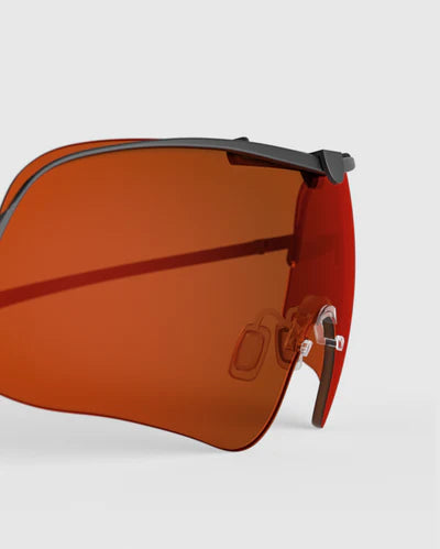 Ranger Falcon Lens sunglasses featuring orange lenses, designed for RIACT A.I & Claysight, shown in a close-up highlighting their sleek, modern frame.