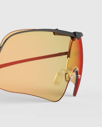 Ranger Falcon Lens sunglasses featuring orange lenses, designed with RIACT A.I & Claysight technology, suitable for various activities and available in multiple colors.