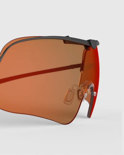 Close-up of Ranger Falcon Lens sunglasses, showcasing sleek design, part of RIACT A.I & Claysight collection, highlighting their advanced eyewear features.