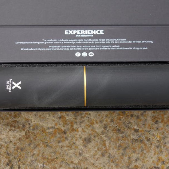 Stalon X108 suppressor with over barrel design, featuring a sleek cylindrical shape on a marbled surface, emphasizing easy maintenance and compatibility.