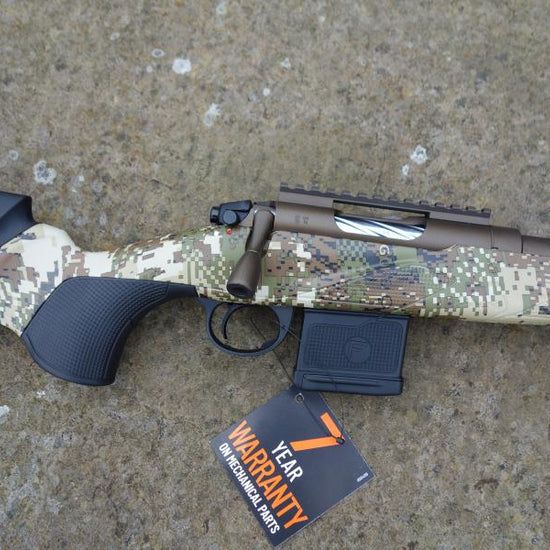 Franchi Horizon Varmint Camo rifle with a camouflaged stock, scope, and visible price tag, featuring a heavy fluted barrel and detachable magazine.