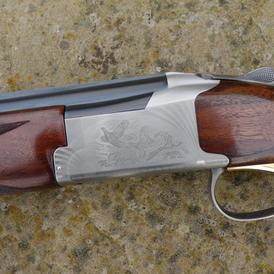 Browning B725 Hunter UK LH Game close-up, showcasing the gun's slim game forend and 6mm rib, highlighting its precision-engineered barrel and multi-choke system.