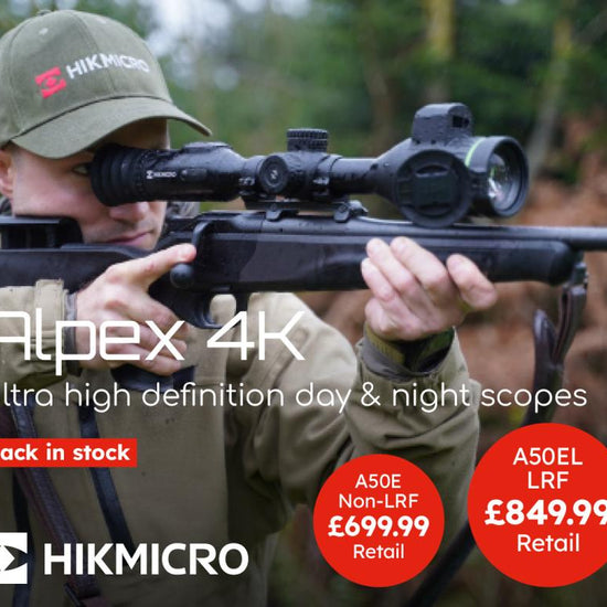 HIKMICRO Alpex HD LRF 4K 3.5-28 Night Vision scope with a man demonstrating aiming, highlighting its advanced rangefinder and night vision capabilities.