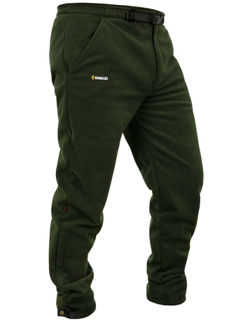 Swazi 4WD Pants | Windproof Fleece Trousers showcased worn by a person, highlighting deep pockets, logo detail, and zipper cuffs for easy wear over boots.