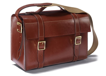 Croots Malton Bridle Leather Cartridge Magazine, a hand-made English brown leather briefcase with a shoulder strap, showcasing fine craftsmanship and durable design.