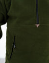 Swazi Doughroaster | Comfortable Fleece Jumper | Olive features a close-up of its long chest zipper and high collar, showcasing its functional design.