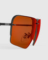 Ranger Edge Lens sunglasses with orange lenses, part of RIACT A.I & Claysight collection, showcasing a sleek, modern eyewear design.