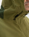Swazi Kagoule Anorak worn by man, showcasing its water-resistant zips, adjustable hood, and large pockets, designed for quiet, waterproof hunting utility.