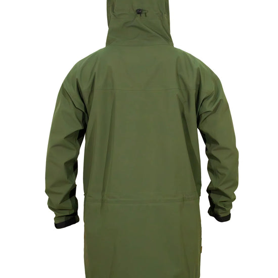 Swazi Tahr Ultralite Jacket, a lightweight, waterproof hunting jacket with a hood, adjustable cuffs, and zippered pockets, worn by a person for outdoor activities.
