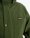 Swazi Wapiti XP Men's Hunting Jacket with visible green fabric, black label, button details; features include waterproof AEGIS fabric, zip-off hood, and multiple pockets.