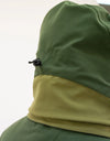 Swazi Wapiti XP Men's Hunting Jacket with zip-off hood, adjustable peak, and waterproof fabric, shown in close-up on a person wearing it.
