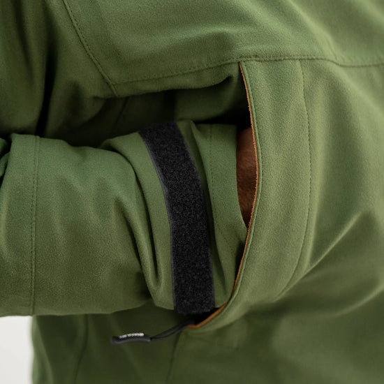 Swazi Wapiti XP Men's Hunting Jacket featuring a zip-off hood, hand warmer pockets, and a durable outer made from quiet, waterproof AEGIS® Whisper fabric.